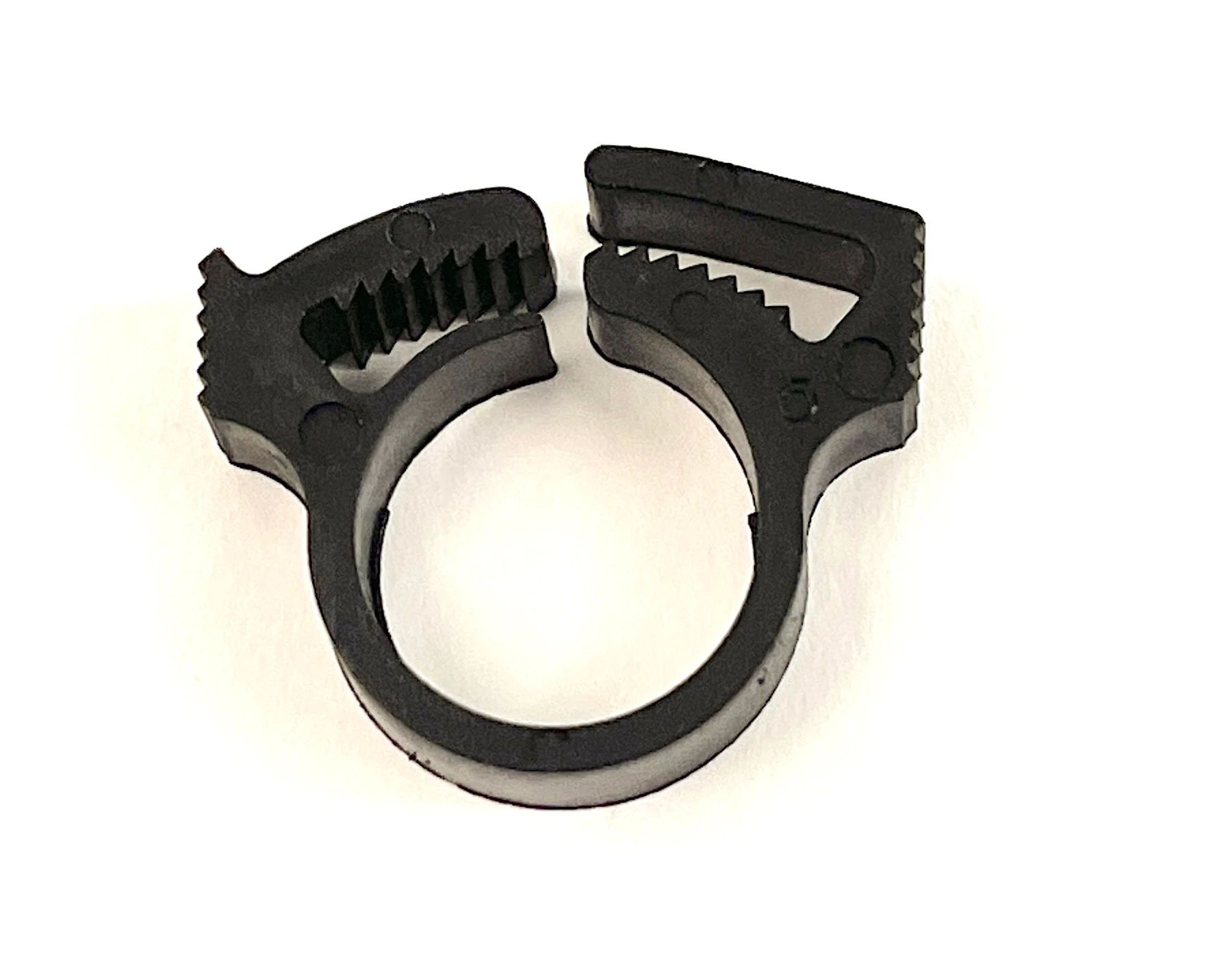 Klämma/clips drevoljeslang.